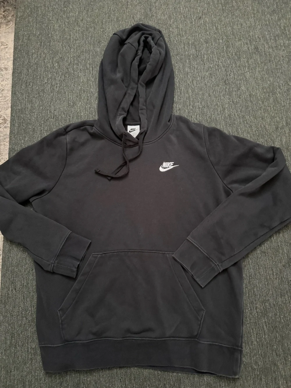 Adult men’s or women’s Nike Black Pullover Hoodie size Medium with White Swoosh